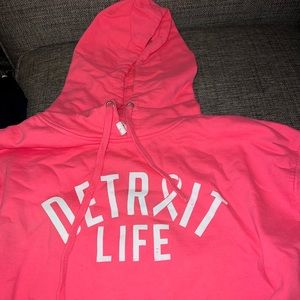 Neon pink hooded with front pocket sweatshirt
